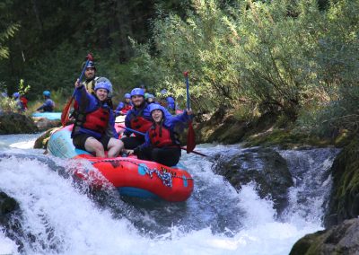 mini rafters laughing while going down a rapid on the White salmon upper gorge