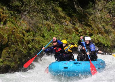 Whitewater rafting guide school students